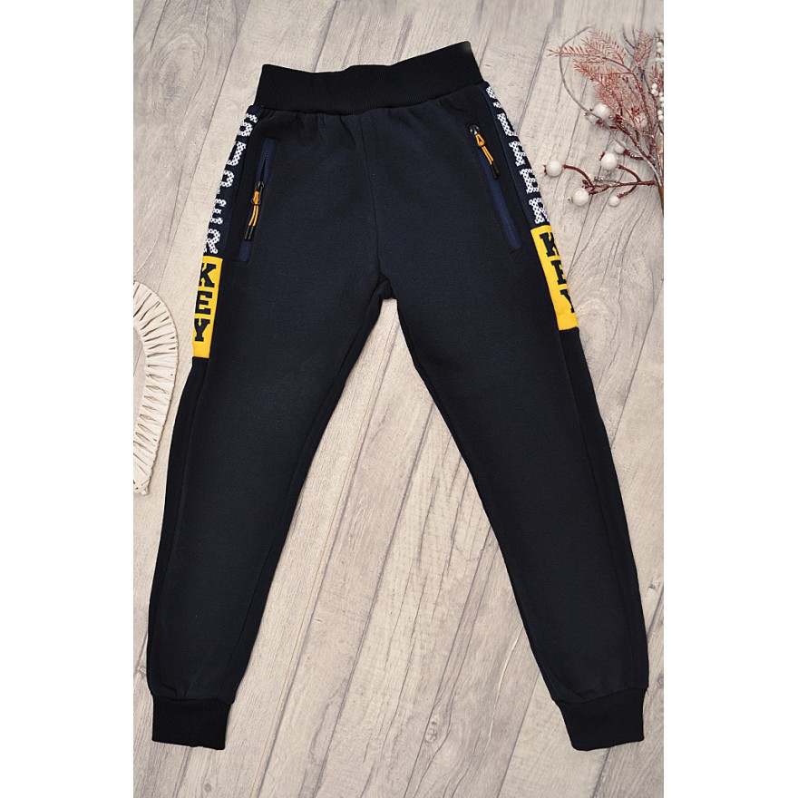 Granatowe SPODNIE ocieplane chłopięce spodenki dresowe SUPER KEY