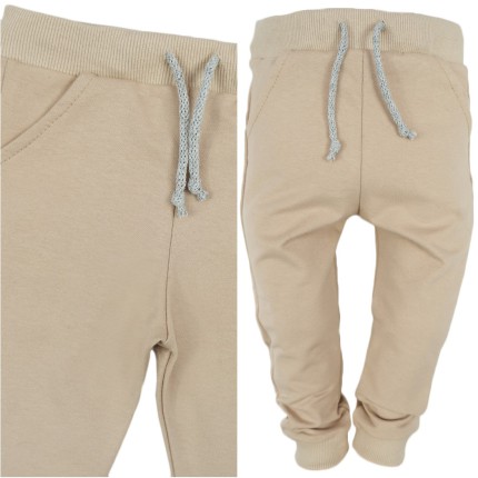 Beżowe spodnie dresowe wiązane wiosna jesień
