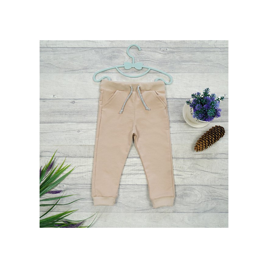 Beżowe spodnie dresowe wiązane wiosna jesień