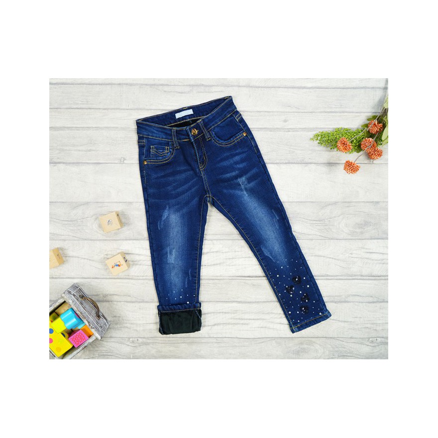 Jeansy granatowe ocieplane dżety na dole