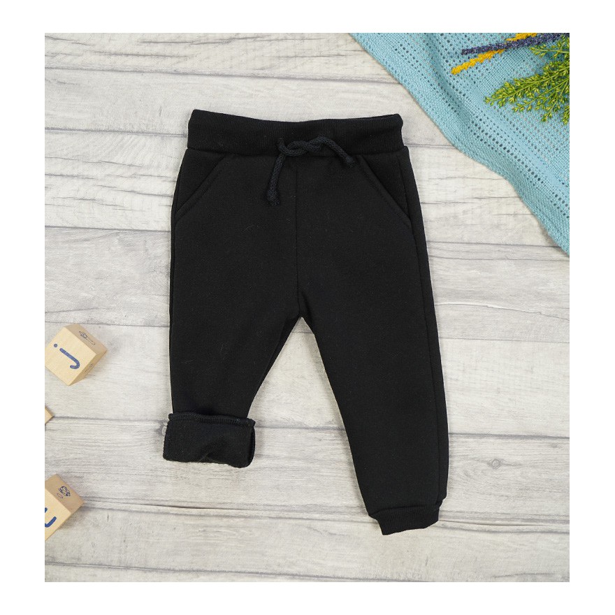 Czarne spodnie dresowe ocieplane wiązane jesień zima