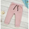 Pudrowy róż spodnie dresowe ocieplane wiązane jesień zima