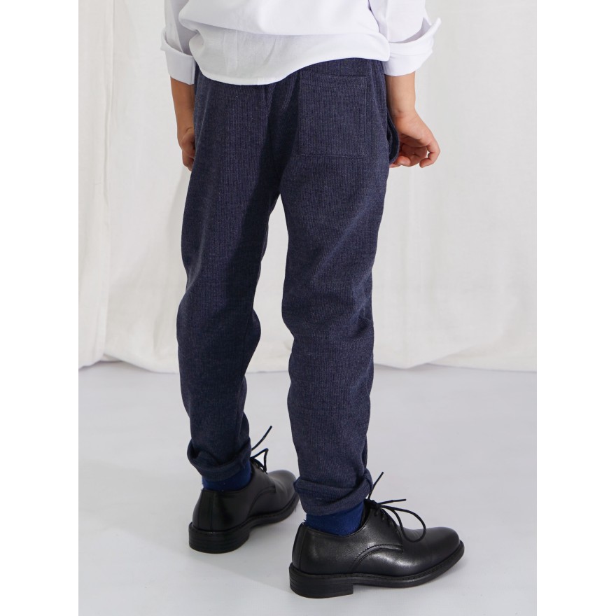 Granatowy jeans eleganckie spodnie wizytowe z wyciąganą gumką prążek slim komunia szkoła