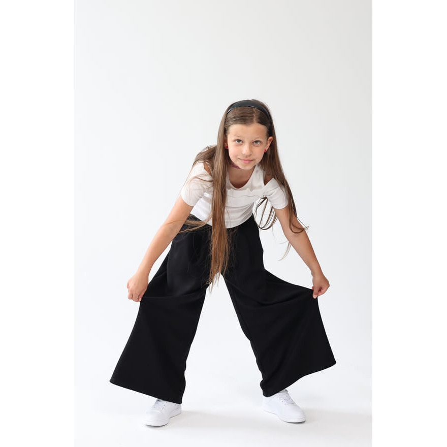 Spodnie eleganckie BELLA czarne WIZYTOWE dziewczęce gładkie z rozszerzanymi nogawkami i regulowaną gumką